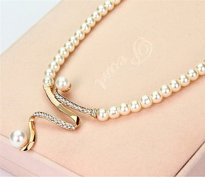 Conjunto de collar + pendientes de perlas naturales