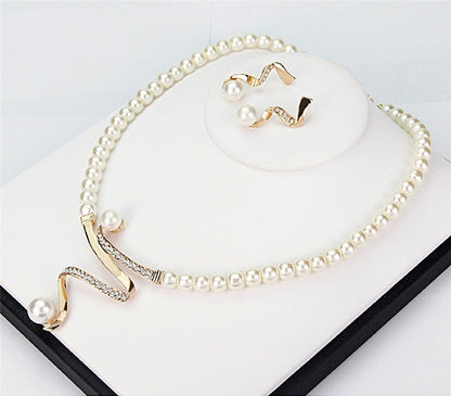 Conjunto de collar + pendientes de perlas naturales